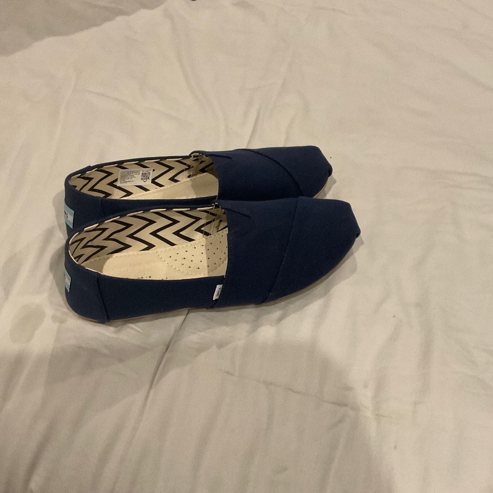 Tom’s Canvas Slip Ons